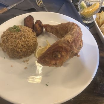 Mangos Southern Kitchen and Bar - Red Snapper with red beans and rice - Breakfast & Brunch Near Me - Tampa, Florida