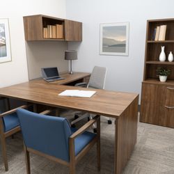 Create Spaces - Executive office furnishings with custom storage and seating for St. John Neumann Church, a faith-based community project by Create Spaces.