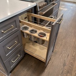 Caliber Custom Cabinetry - Interior organization - pullout utensil organizer