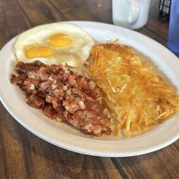 Corn beef hash, crispy hash browns, and Sunnyside eggs. Corn beef hash, crispy hash browns, and Sunnyside eggs.