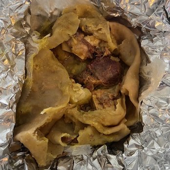 Caribbean Chicken & Fish - Ended of tossing this. Roti was falling apart and soft! - Caribbean Near Me - Scottdale, Georgia