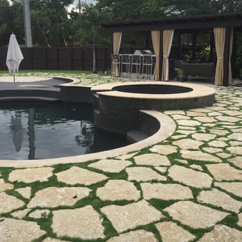 Designer Patio - a patio with a pool and a gazebo - General Contractors Near Me - Miami, Florida Designer Patio - a patio with a pool and a gazebo - General Contractors Near Me - Miami, Florida