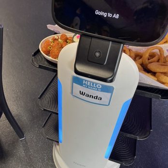 Insert Coin - The robot that served food to me which I wanted to be a human being serving the food not technology or robots. - Bars Near Me - Olympia, Washington