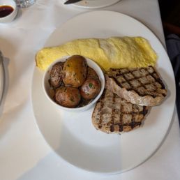 Omelet with potatoes and sourdough toast