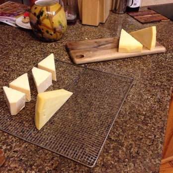 Emanar Cellars - Prepping some cheese to put in the smoker to bring in tomorrow. - Wine Bars Near Me - Battle Ground, Washington