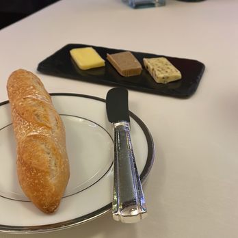 Bayview - Bread with a selection of butter. Far right us Brittany seaweed butter - French Near Me - Geneva, GE