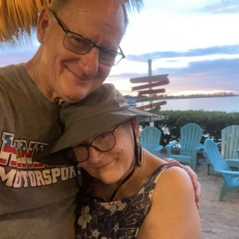 Nokomo's Sunset Hut - My wife and I, enjoying the sunset. - Seafood Near Me - Nokomis, Florida Nokomo's Sunset Hut - My wife and I, enjoying the sunset. - Seafood Near Me - Nokomis, Florida