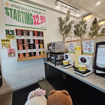Market Green Table - Grab a Ramen package from the wall, add water, and warm it up right here, next to the microwaves - Convenience Stores Near Me - Las Vegas, Nevada