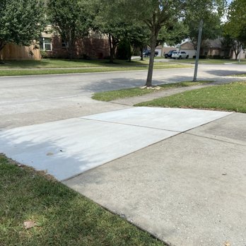 Wood Construction Services - a sidewalk with a concrete slab - Masonry/Concrete Near Me