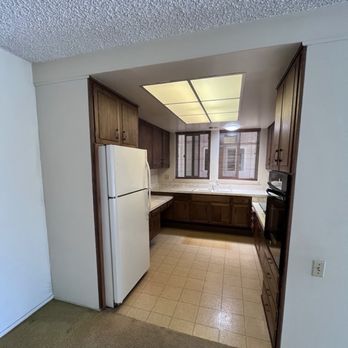 Konrad Konstruction - Old kitchen and popcorn ceilings - General Contractors Near Me