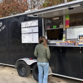 Ramon's Food & Coffee Cart - a woman standing in front of it - Food Trucks Near Me - Durham, New Hampshire Ramon's Food & Coffee Cart - a woman standing in front of it - Food Trucks Near Me - Durham, New Hampshire