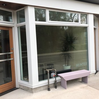 Hunter Coffee Shop - a bench in front of a window - Coffee & Tea Near Me - Toronto, Ontario Hunter Coffee Shop - a bench in front of a window - Coffee & Tea Near Me - Toronto, Ontario