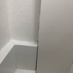 Cracked tile and poorly painted