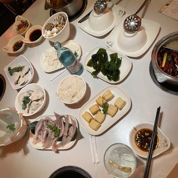 Lao Pot - Hot pot noods, fresh squid, tofu fish balls, seaweed belts, rice, pork and dumplings, mushroom platter and Korean rice cakes - Hot Pot Near Me - Madison Heights, Michigan