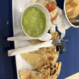 Cheese quesadilla and the famous green sauce Cheese quesadilla and the famous green sauce