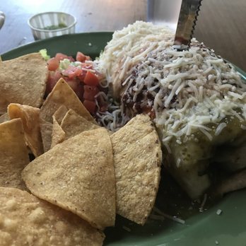 Pecado Bueno - Wet burrito with all three sauces - Mexican Near Me - Seattle, Washington Pecado Bueno - Wet burrito with all three sauces - Mexican Near Me - Seattle, Washington