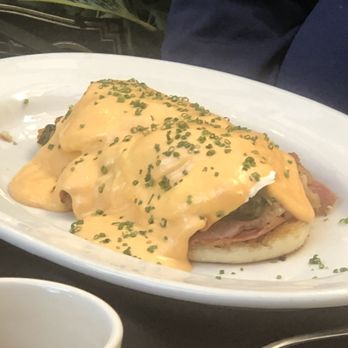 Coast Range - Egg Benedict - Brunch menu. Spinach & tomato hollandaise sauce. - Steakhouses Near Me - Solvang, California Coast Range - Egg Benedict - Brunch menu. Spinach & tomato hollandaise sauce. - Steakhouses Near Me - Solvang, California
