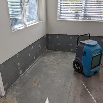 Ace Flood Damage - Interior repair under way - drying out block after removal of flooring, trim, and drywall - General Contractors Near Me - Vista, California