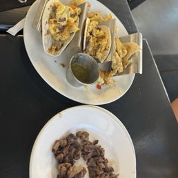 Steak egg tacos over cooked steak