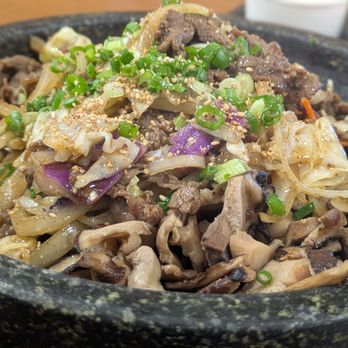 Yoo’s Place - #26 Assorted Mushroom & Beef over Rice in Sizzling Stone Plate with Spicy Sauce - Korean Near Me - Westminster, California