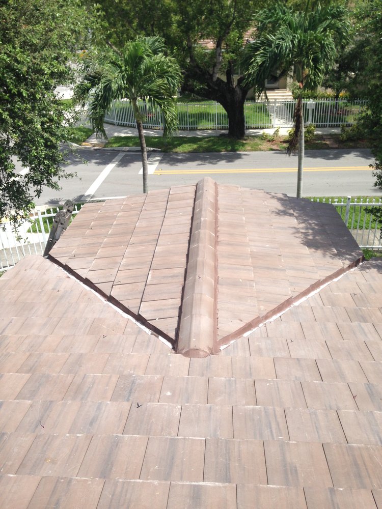 Slide of Excellence Roofing