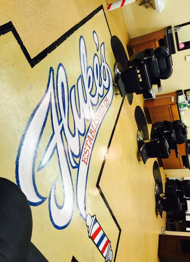 Fluke's Barber Shop Logo
