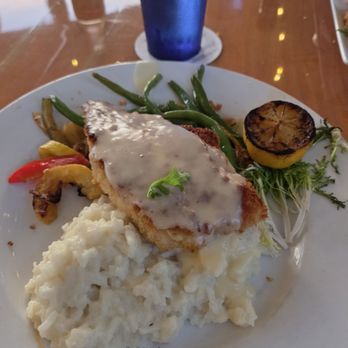 Frigate's Waterfront Bar and Grill - Macadamia Snapper with lemony beurre blanc wine sauce, risotto and the most delicious veggies - Seafood Near Me - Melbourne, Florida