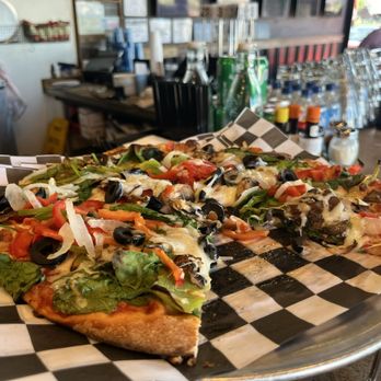 Yonx PIzza Bar - I accidentally dug in before taking the photo! - Pizza Near Me - Wylie, Texas Yonx PIzza Bar - I accidentally dug in before taking the photo! - Pizza Near Me - Wylie, Texas