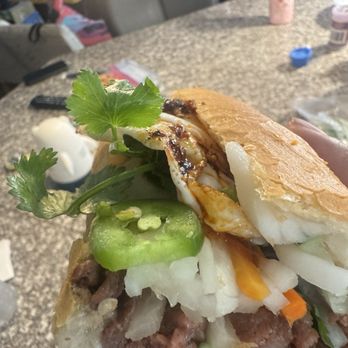 Dakao Sandwiches - Number 6 with homemade over easy/medium fried egg, hot chile oil, hoisin sauce, and siracha. - Sandwiches Near Me - Las Vegas, Nevada