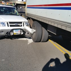 Post Road Auto Body Shop - Not fun when a truck cuts in from over double yellow. Post Road Auto body rescued my Explorer.