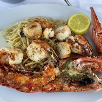 Pier 95 Restaurant - Marina - "mariscada" (lobster, shrimp & scallops, without mussels & clams, over linguine) - Seafood Near Me - Freeport, New York Pier 95 Restaurant - Marina - "mariscada" (lobster, shrimp & scallops, without mussels & clams, over linguine) - Seafood Near Me - Freeport, New York