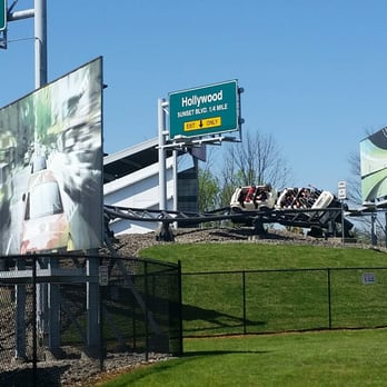Queen City Stunt Coaster - A train entering a "subway tunnel" (the nondescript themeing is ehhh) - Amusement Parks Near Me - Kings Mills, Ohio Queen City Stunt Coaster - A train entering a "subway tunnel" (the nondescript themeing is ehhh) - Amusement Parks Near Me - Kings Mills, Ohio