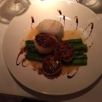 Bistro 821 - These scallops were out of this world. Cooked to perfection and simply giant. The rice and asparagus was a great pairing - Seafood Near Me - Naples, Florida