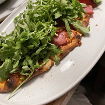 The Library Bar & Bites - Prosciutto and Arugula Flatbread - Cocktail Bars Near Me - Fairbanks, Alaska The Library Bar & Bites - Prosciutto and Arugula Flatbread - Cocktail Bars Near Me - Fairbanks, Alaska