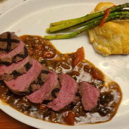 Chez Nous - Medium rare Venison. (don't recall what the cheesy filling in the puffed pastry was.) - food, steak - New American Near Me - Schenectady, New York