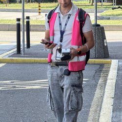 Terravision - Ticket attendant who scans QR codes for folks waiting to board the bus, and who lied about the bus arrival to deflect accountability.