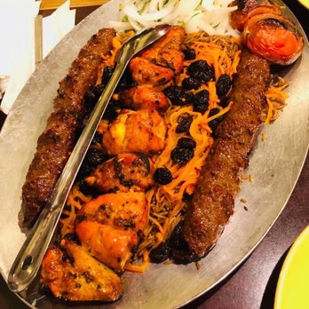 Kabul Kabab House - Combo 2, sans the lamb shank substitution provided on another plate.  Qaebeli added atop brown rice. - Afghan Near Me - Flushing, New York
