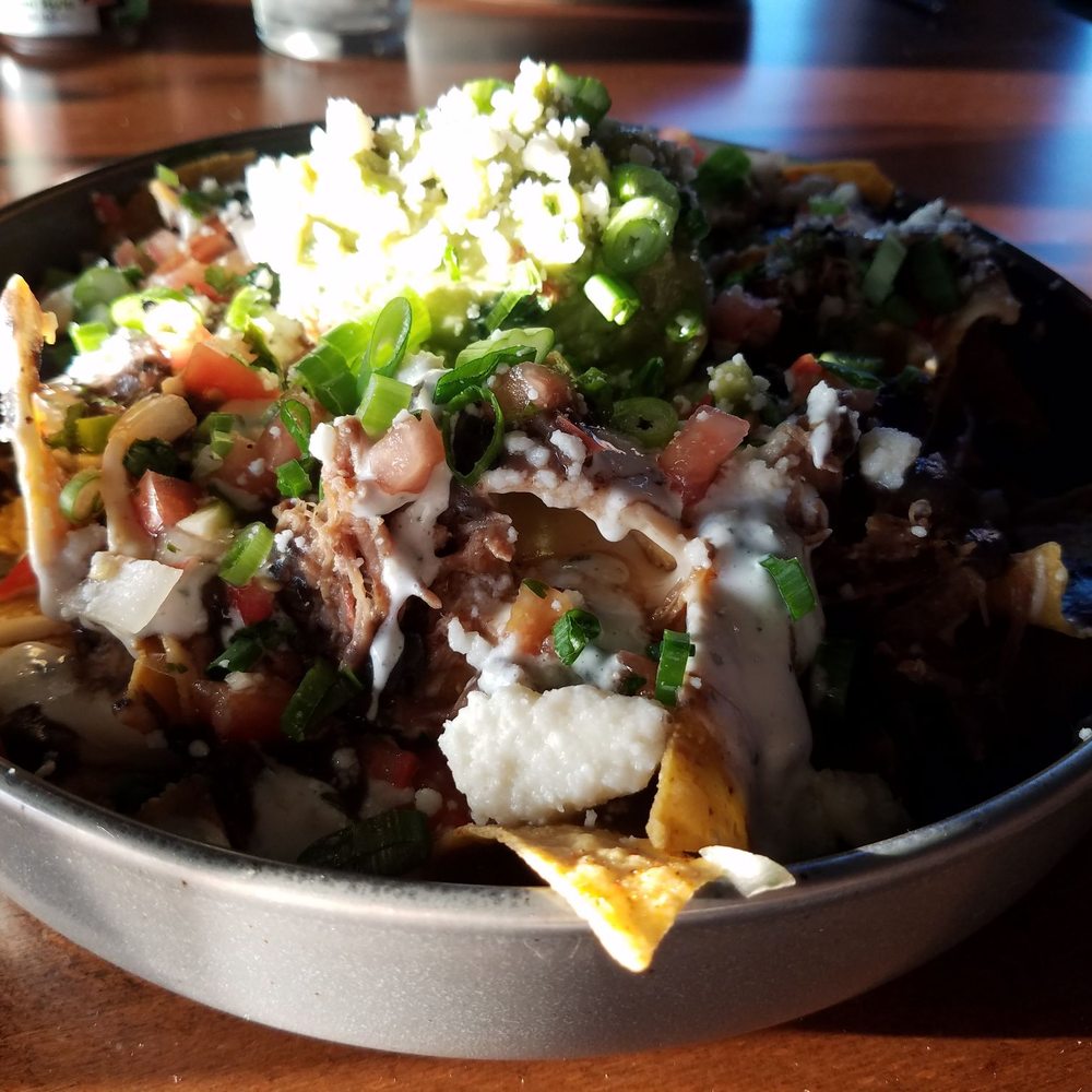 Proof - The Best Tasting Nachos winking @ u n saying eat me - New American Near Me - Kennewick, Washington