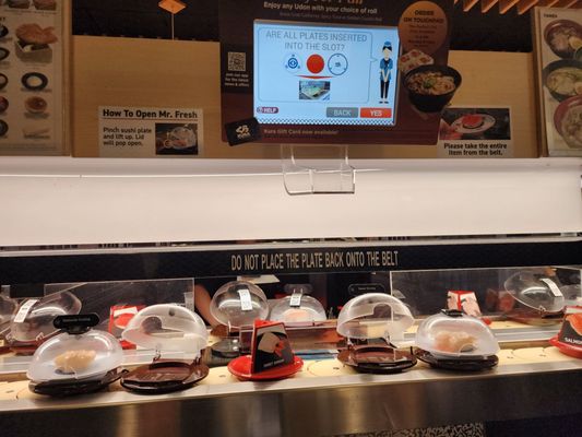 Kura Revolving Sushi Bar by null