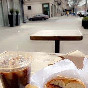 BO's Bagels - a sandwich and a drink on a table - Bagels Near Me - New York, New York