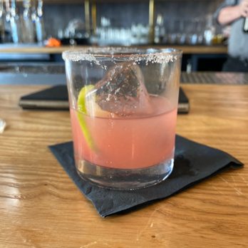 Lo Bar - a pink drink with a lemon wedge - Bars Near Me - Portland, Oregon