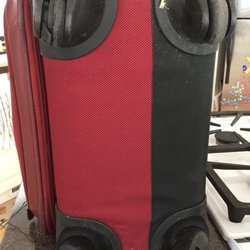 Luggage Doctor - One replaced, discentegrated wheel, 3 original wheels.
