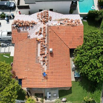 The Roofers - Lift and relay of tiles in progress. Underlayment has been replaced. - Roofing Near Me