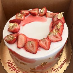 Whipped cream covered - vanilla and fresh strawberry Whipped cream covered - vanilla and fresh strawberry