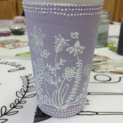 The Clay Emporium - Another one I did (not yet fired). It's a travel mug! You get to choose whether you want a black or white cover top.