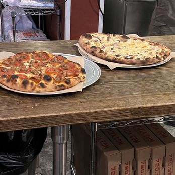 Wood Paddle Pizza and Tap - Carnivore pizza on the left. - Pizza Near Me - Aurora, Colorado Wood Paddle Pizza and Tap - Carnivore pizza on the left. - Pizza Near Me - Aurora, Colorado