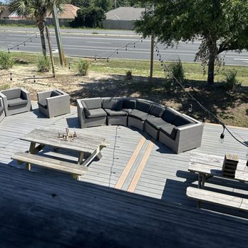 The Grey Taproom - Outside seating area - Bars Near Me - Navarre, Florida The Grey Taproom - Outside seating area - Bars Near Me - Navarre, Florida