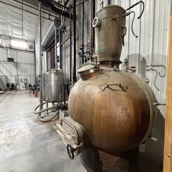 Kentucky Bourbon Boys - Antique still at Bluegrass Distillery - Tours Near Me