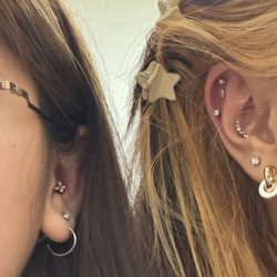 Infinity Piercings - Left: Conch; Right: Hidden Helix