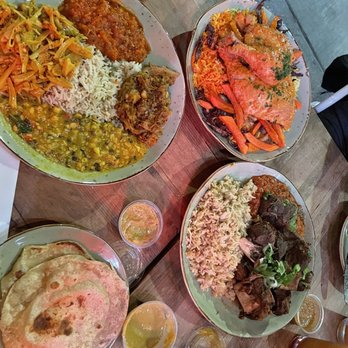 Flavors From Afar - Roti, SOMALI OVEN ROASTED CHICKEN FRIED RICE PLATE, Palau Masala Goat Pulao Pooja Plate (Prayer Plate) (Vegan) - Somali Near Me - Los Angeles, California Flavors From Afar - Roti, SOMALI OVEN ROASTED CHICKEN FRIED RICE PLATE, Palau Masala Goat Pulao Pooja Plate (Prayer Plate) (Vegan) - Somali Near Me - Los Angeles, California